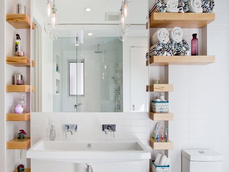 Consider open shelving for bathroom vanity