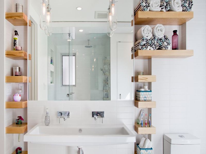 Consider open shelving for bathroom vanity