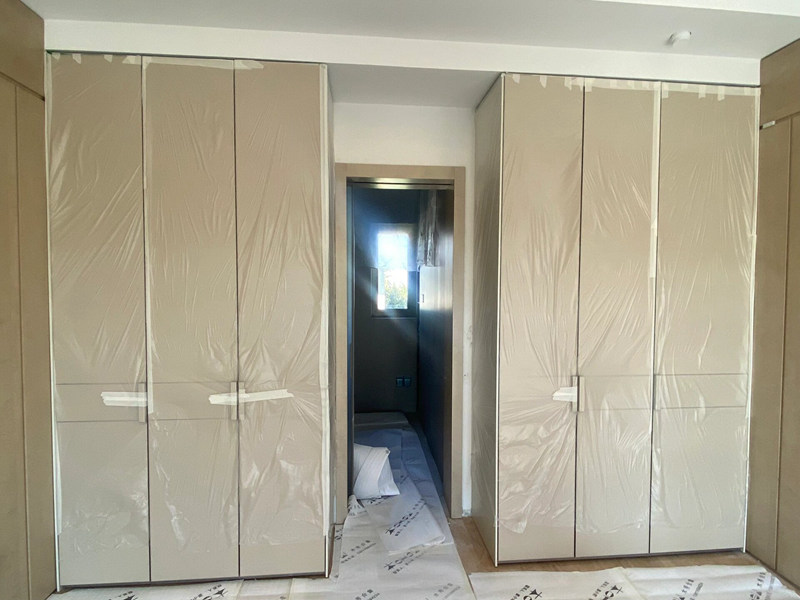 Minimalist Light Leather Wardrobe with Copper Wire Inlays